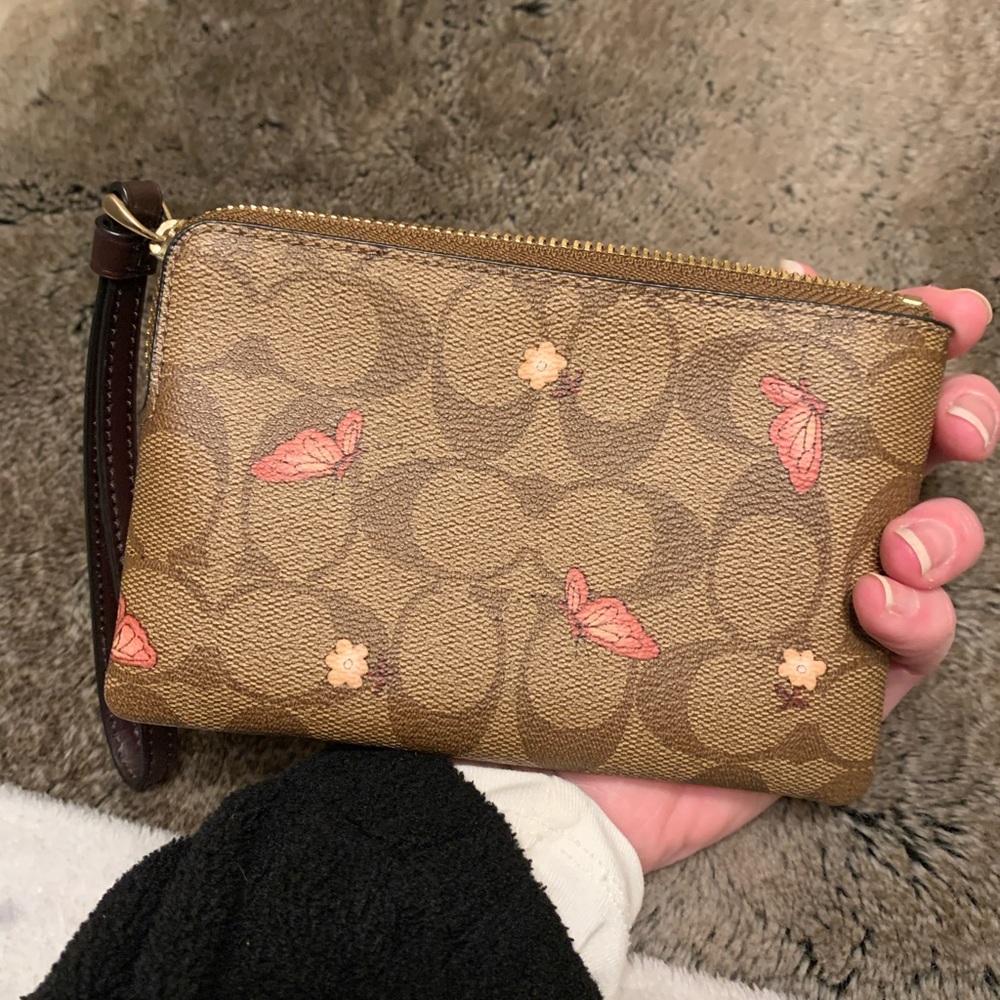 Cute never used Coach butterfly wristlet